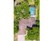 Aerial shot of a private backyard showcasing a sparkling pool and well-maintained landscaping at 237 Manatee Rd, Winter Haven, FL 33884