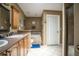 Bathroom with a double sink vanity, soaking tub, glass enclosed shower, and neutral walls at 237 Manatee Rd, Winter Haven, FL 33884