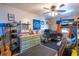 Neutral bedroom with a ceiling fan, a bunk bed, and themed decor at 237 Manatee Rd, Winter Haven, FL 33884
