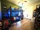 A bedroom with a bunk bed and loads of toys and wall decor at 25863 Crossings Bluff Ln, Sorrento, FL 32776