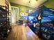 A bedroom with a bunk bed and loads of toys and wall decor at 25863 Crossings Bluff Ln, Sorrento, FL 32776