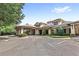 Stunning community clubhouse with covered entryway, meticulously maintained landscaping, and ample parking at 25863 Crossings Bluff Ln, Sorrento, FL 32776