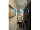 Laundry room with window, decorative artwork, and updated washer and dryer at 25863 Crossings Bluff Ln, Sorrento, FL 32776