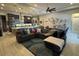 Open-concept living room boasts an airy atmosphere and a seamlessly integrated kitchen and dining area at 25863 Crossings Bluff Ln, Sorrento, FL 32776