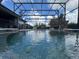 A serene backyard pool and screen enclosure offer privacy and outdoor enjoyment at 25863 Crossings Bluff Ln, Sorrento, FL 32776