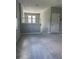 Upstairs bonus room provides extra living space with neutral paint and carpet, plus hall access to bedrooms at 2609 Village Lakes Blvd, Lakeland, FL 33805