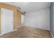 Inviting bedroom with neutral carpeting, and multiple white doors leading to other rooms at 2740 Rochelle Dr, Winter Haven, FL 33881