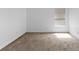 Bright bedroom with neutral carpet and natural light from window at 2740 Rochelle Dr, Winter Haven, FL 33881
