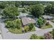 Aerial view of the home featuring a screened in pool at 2800 Sunset Nw Dr, Winter Haven, FL 33881