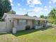 Charming brick home with well-maintained lawn and landscaping at 2800 Sunset Nw Dr, Winter Haven, FL 33881