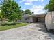 Inviting home featuring a carport and well-kept front yard at 2800 Sunset Nw Dr, Winter Haven, FL 33881