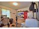 A bedroom featuring a sofa, weightlifting equipment, and TV at 286 Cove At Eagle Lake Cir, Eagle Lake, FL 33839