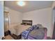 Cozy bedroom with neutral walls, comfortable bed, and a window for natural light at 286 Cove At Eagle Lake Cir, Eagle Lake, FL 33839