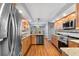 Well-appointed kitchen with stainless steel appliances, hardwood floors, and ample counter space at 2861 Pond View Dr, Haines City, FL 33844