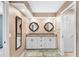 The main bathroom has dual sinks, granite countertops, and a separate door to the toilet at 2861 Pond View Dr, Haines City, FL 33844