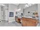 Primary bathroom features dual sinks, granite countertops, and decorative accents at 308 Kissengen Park Dr, Bartow, FL 33830