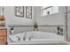 Corner bathtub with gray tile surround and modern faucet at 308 Kissengen Park Dr, Bartow, FL 33830