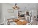 Open-concept dining area adjacent to the kitchen and living room, perfect for Gathering meals and gatherings at 308 Kissengen Park Dr, Bartow, FL 33830