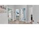 Bright hallway providing easy access to different areas within the home at 308 Kissengen Park Dr, Bartow, FL 33830