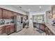 Well-equipped kitchen with stainless steel appliances, sleek cabinetry, and a stylish backsplash at 308 Kissengen Park Dr, Bartow, FL 33830