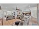 Large living area with hardwood floors, comfortable seating, and an open layout at 308 Kissengen Park Dr, Bartow, FL 33830