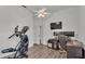 Multi-purpose room with exercise equipment and office setup at 308 Kissengen Park Dr, Bartow, FL 33830
