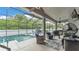 Large screened-in pool offers plenty of room for outdoor dining and lounging at 308 Kissengen Park Dr, Bartow, FL 33830