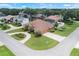 Aerial shot of a home showing meticulous landscaping and a corner lot location at 328 Hamilton Shores Ne Dr, Winter Haven, FL 33881
