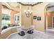 Bright breakfast nook with a glass table and views of the pool and patio at 328 Hamilton Shores Ne Dr, Winter Haven, FL 33881