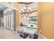 Bright breakfast nook features backyard pool view and elegant chandelier at 328 Hamilton Shores Ne Dr, Winter Haven, FL 33881
