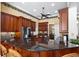 Elegant kitchen with granite countertops, stainless steel appliances, and ample counter space at 328 Hamilton Shores Ne Dr, Winter Haven, FL 33881