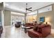 Bright and airy living room with access to the patio area and view of the dining room at 328 Hamilton Shores Ne Dr, Winter Haven, FL 33881