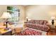 Cozy sitting room with plush seating, a large window, and ample natural light at 328 Hamilton Shores Ne Dr, Winter Haven, FL 33881