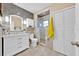 This cozy bathroom features a stand up shower, tiled floors, and decorative backsplash at 345 Avenue J Se, Winter Haven, FL 33880