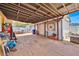 Carport, featuring space for multiple vehicles and additional storage at 345 Avenue J Se, Winter Haven, FL 33880