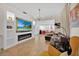 Spacious living room with tile flooring, built-in shelving, fireplace, and bright natural light at 345 Avenue J Se, Winter Haven, FL 33880