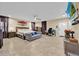 This main bedroom boasts plenty of room, tile floors, and natural light at 345 Avenue J Se, Winter Haven, FL 33880