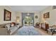 Comfortable living room with sliding glass doors to outdoor patio at 3717 Tigereye Ct, Mulberry, FL 33860