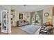 Cozy living room featuring comfortable seating, with a view of the backyard through sliding glass doors at 3717 Tigereye Ct, Mulberry, FL 33860