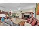 Bright open-concept living space featuring a kitchen with bar seating, breakfast nook, and living room at 3717 Tigereye Ct, Mulberry, FL 33860