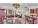 Open-concept living space with a dining area, a living room, and bar seating at the kitchen counter at 3717 Tigereye Ct, Mulberry, FL 33860