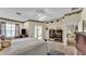 Open main bedroom with access to back yard and built in shelving at 3717 Tigereye Ct, Mulberry, FL 33860