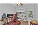 Cozy office with built-in shelving and decor at 3717 Tigereye Ct, Mulberry, FL 33860