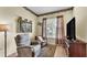 Sitting area in the bedroom with natural lighting and cozy furniture at 3717 Tigereye Ct, Mulberry, FL 33860