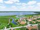 Breathtaking aerial view of the community, showcasing the lake, golf course, and beautiful homes at 4105 Limerick Dr, Lake Wales, FL 33859