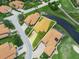 Stunning aerial view of a single Gathering home with a manicured lawn, and a serene waterfront at 4105 Limerick Dr, Lake Wales, FL 33859
