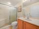 Bathroom showcasing a glass enclosed shower and a vanity with generous counter space at 4105 Limerick Dr, Lake Wales, FL 33859