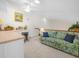 Bonus room featuring desk, seating, carpeted floors, and vaulted ceilings at 4105 Limerick Dr, Lake Wales, FL 33859