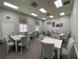 Brightly lit game room with tables, chairs, and tasteful decor at 4105 Limerick Dr, Lake Wales, FL 33859