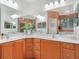 The main bathroom features double sinks, vanity storage, and a large mirror above the countertop at 4105 Limerick Dr, Lake Wales, FL 33859